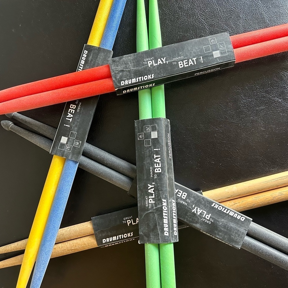 5 Sets of Drumsticks 4 Colourful Nylon 1 Regal Tip Wooden Set